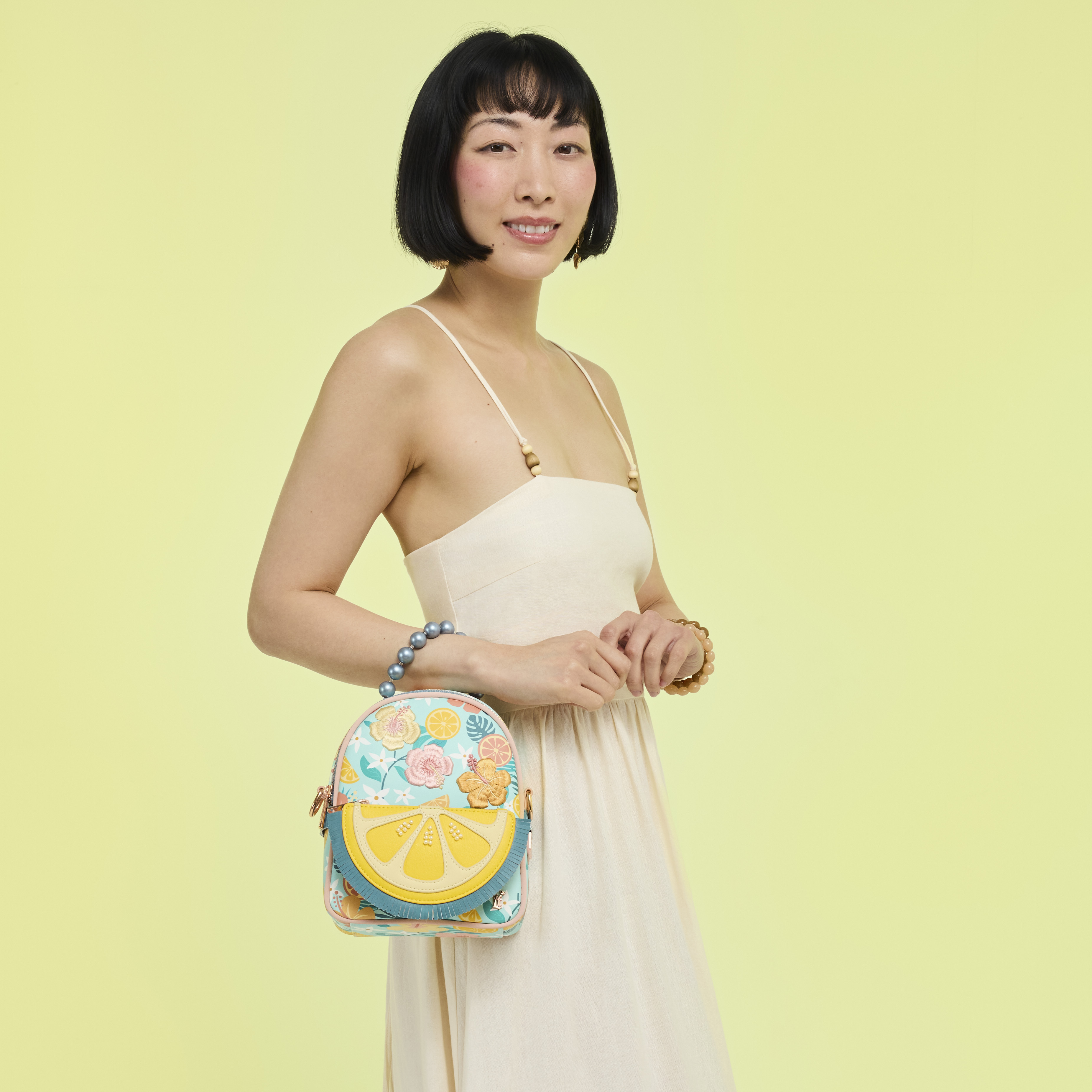 Loungefly Tropical Lemon Floral Convertible Mini Backpack  display picture 1